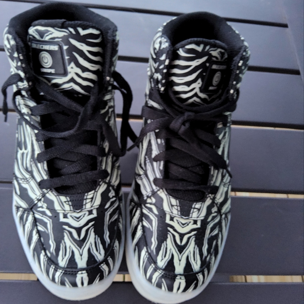 Skechers limited edition light up leather/ synthetic high top shoes.Rechargeable